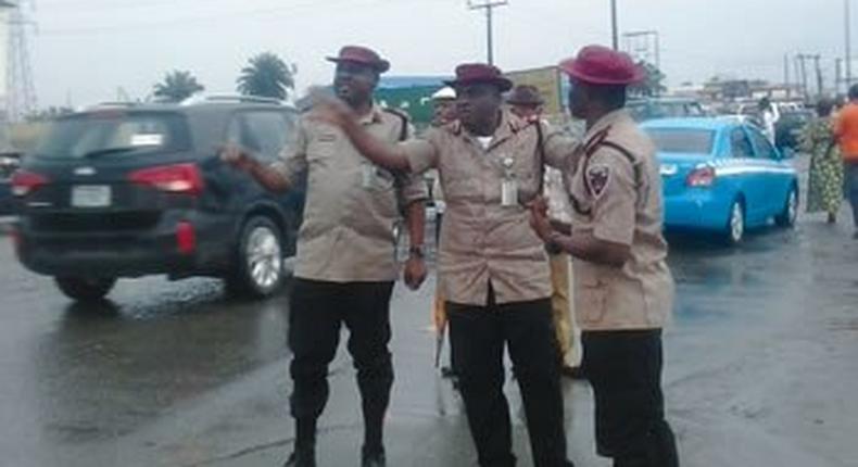 Mr. Imoh Etuk (middle) and two other FRSC officials 