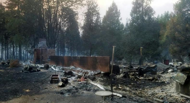 A burned out house is seen after the passing of the Holiday Farm fire in McKenzie Bridge, Oregon