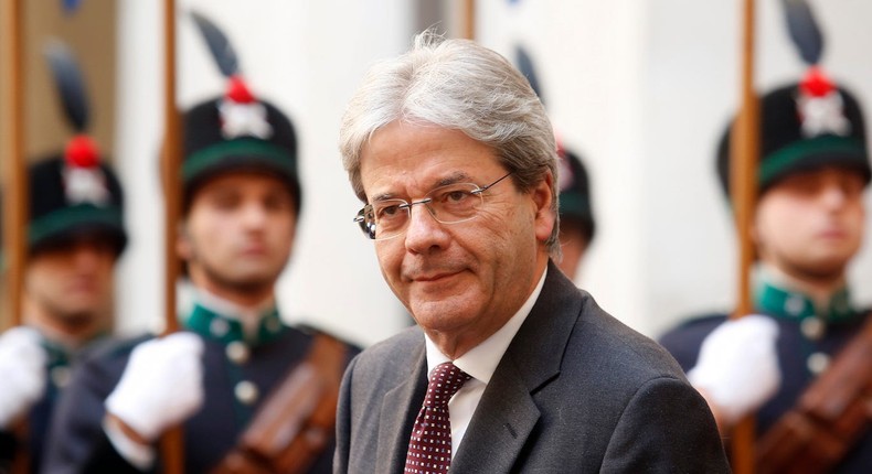 Italian Prime Minister Paolo Gentiloni looks on as he waits for the arrival of Britain's Prince Charles at Chigi Palace in Rome, Italy, April 5, 2017.