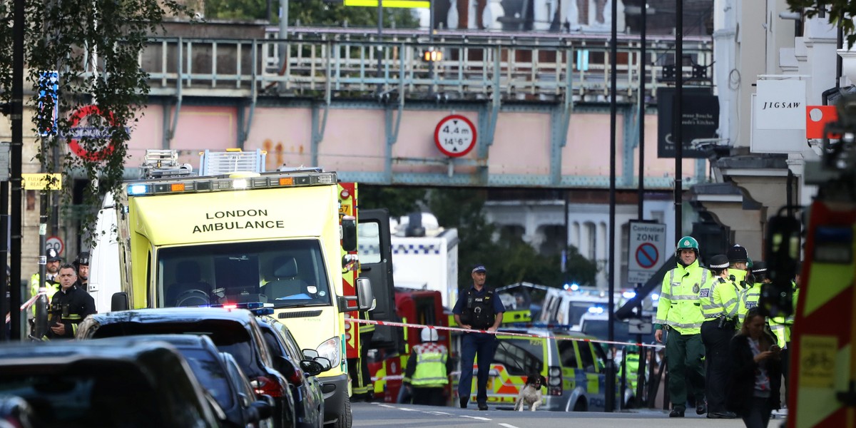 An ambulance and police officers outside Parsons Green station on Friday morning.