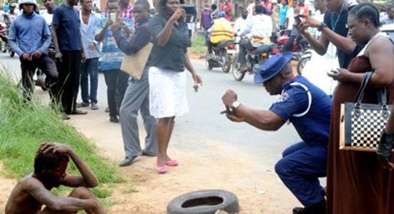 Mad men caught with decomposing human head