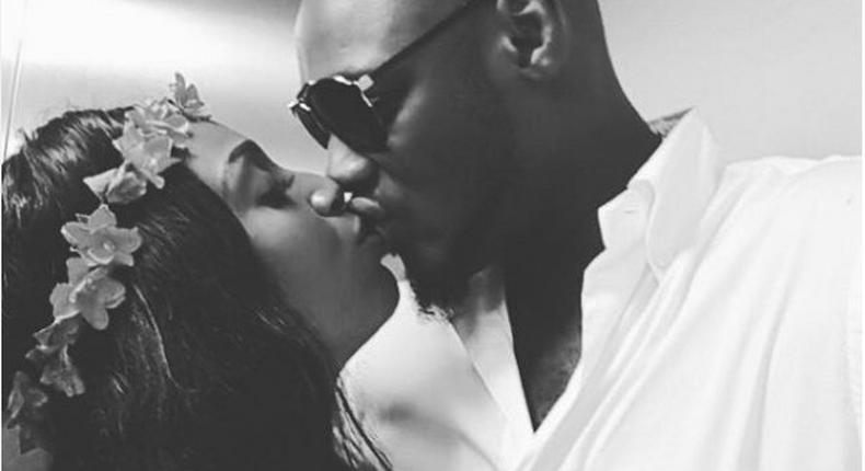 Annie Idibia and 2Face Idibia share a kiss.