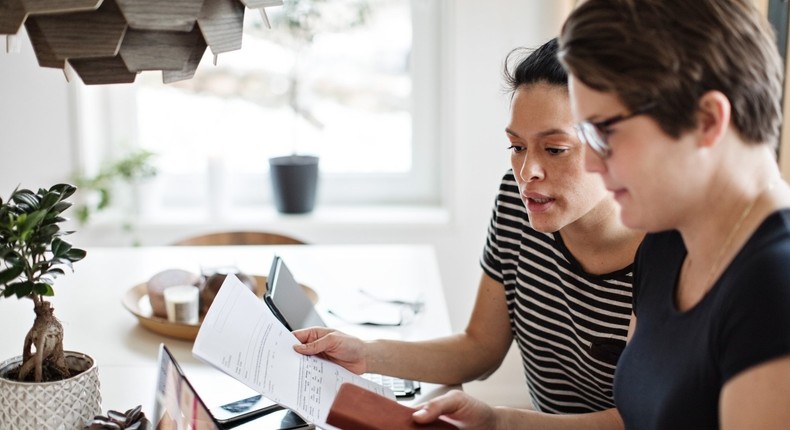 couple looking at bills