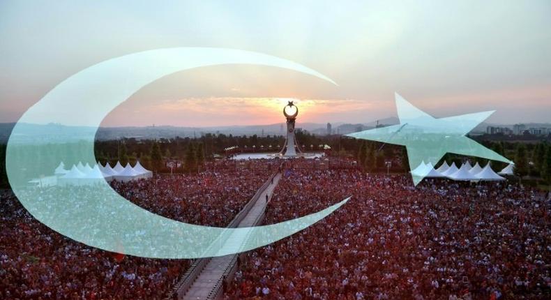 People attend the opening ceremony of the July 15 martyrs’ monument in Ankara on July 16, 2017