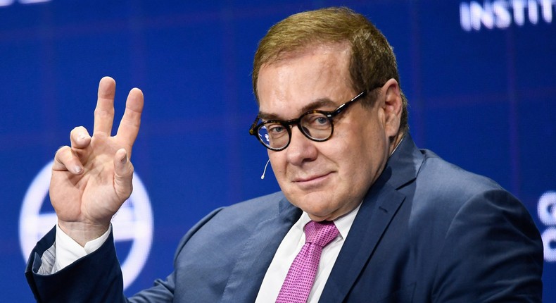 Scott Minerd, Chairman of Investments and Global Chief Investment Officer at Guggenheim Partners, raises his hand during the Milken Institute Global Conference on October 18, 2021 in Beverly HIlls, California.