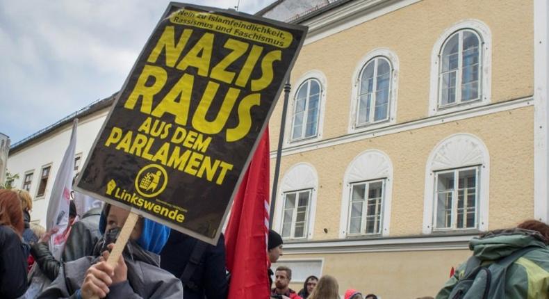 Protesters gather outside the house where Adolf Hitler was born during an anti-Nazi protest in Braunau Am Inn, Austria, in April 2015