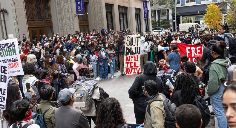 Pro-Palestine students at New York University hold a walk out from school to demonstrate against the Israeli bombardment of Gaza on October 25, 2023Andrew Lichtenstein/Corbis via Getty Images