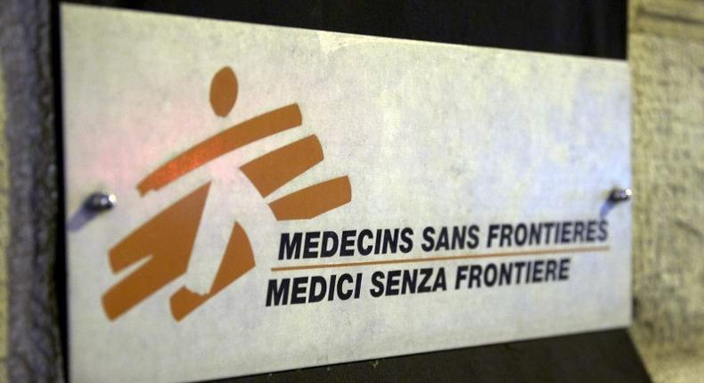 A sign is pictured over a black sheet outside the Medecins Sans Frontieres (MSF) headquarters in Geneva, Switzerland October 7, 2015. 