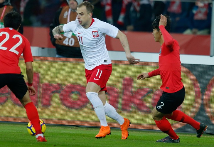 Kamil Grosicki (C) i Yong Lee (P)