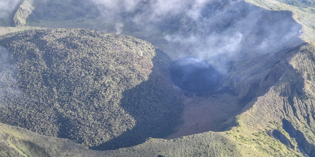 Steam rises from a dome which formed in the the volcano La Soufriere near the community of Rosehall
