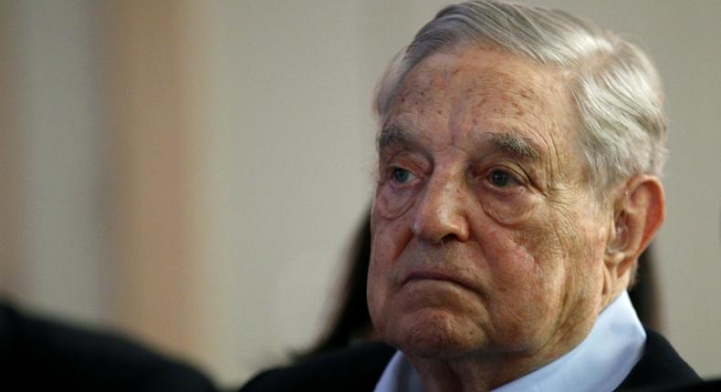 FILE- In this May 29, 2018, file photo George Soros, Founder and Chairman of the Open Society Foundations listens to the conference after his speech entitled