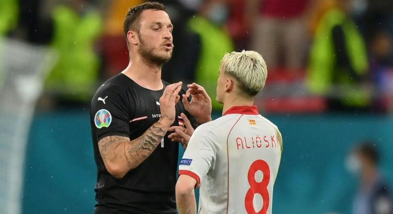 Arnautovic (L) spoke to Alioski (R) after the game Creator: Justin Setterfield