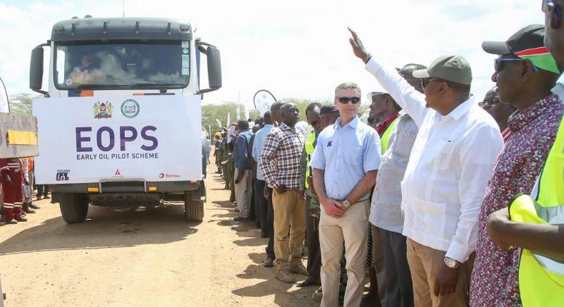 President Uhuru Kenyatta flanked by Deputy President William Ruto flags off the crude oil trucks during the Inauguration of the Ngamia 8 Early Oil Pilot Scheme, Turkana County. (The Standard)