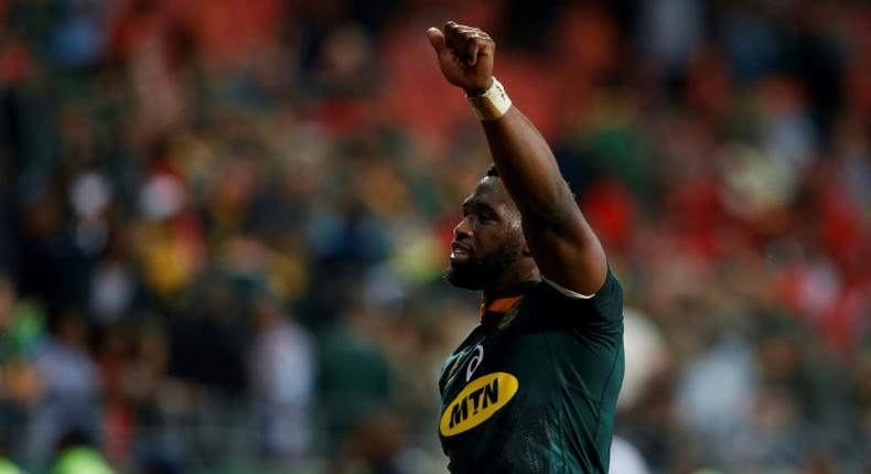 Siya Kolisi South Africa's black captain lifting the Rugby World Cup trophy would be a hugely symbolic moment former Boks assistant coach Alan Solomons told AFP