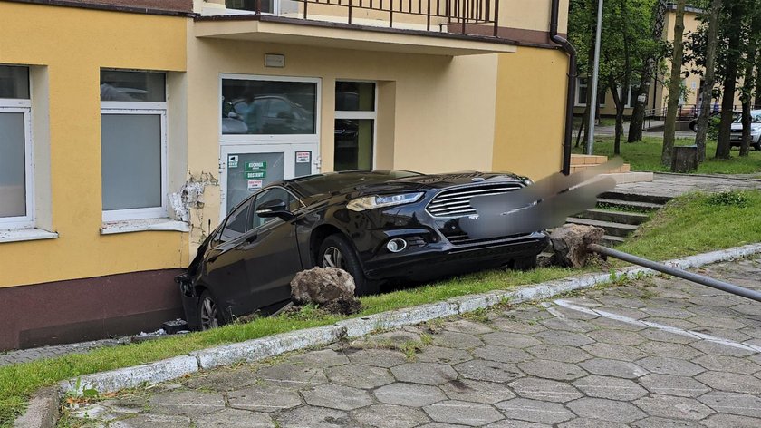 Ford hit two people and damaged the building
