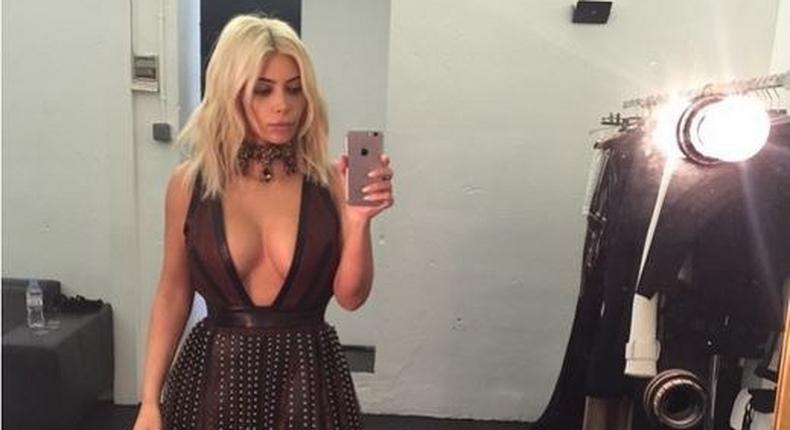 Kim Kardashian exposes ample cleavage in new photo