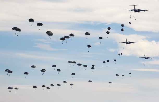 U.S. Paratroopers from the 82nd Airborne Division participate in a massive airdrop from C-17 Globema