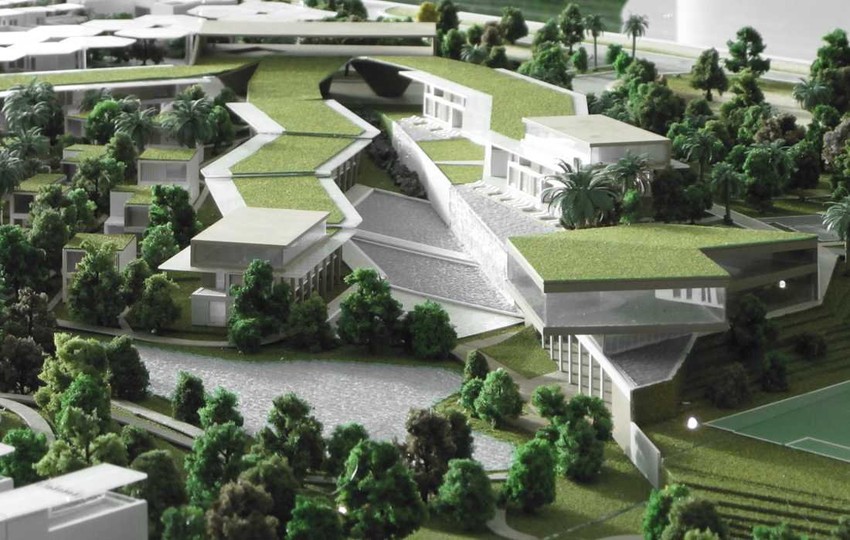 Kompleks će obuhvatati stambene jedinice, ekološku školu, mesnu zajednicu, konjički klub, garaže prekrivene solarnim panelima i farmu organske hrane