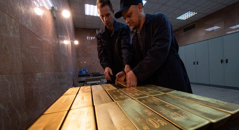 Most of the time, large-format gold bars never leave the storage vaults where they're kept under meticulous security.Alexander Manzyuk/Anadolu Agency via Getty Images