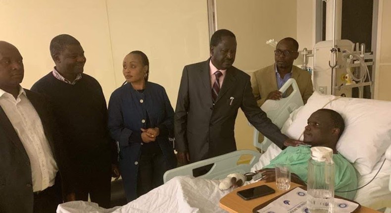 File image of Raila Odinga and other leaders when they visited ailing Norman Magaya in hospital