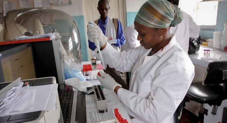 Scientists are the world's most trusted profession (AP Photo/Khalil Senosi)