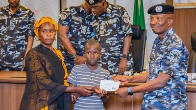 Egbetokun presents ₦535.6m cheques to families of deceased officers. [Twitter:@PoliceNG]