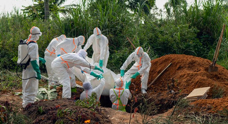 A body being carefully disposed by Health workers