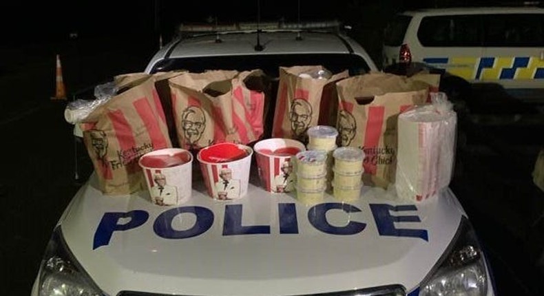 Bags of KFC chicken, french fries, and coleslaw were found in the car's trunk.
