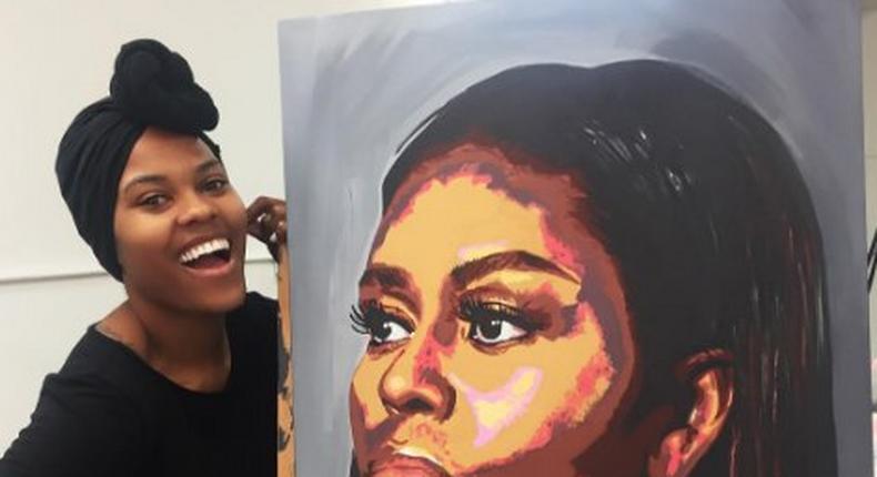 Artist beside the Michelle Obama portrait