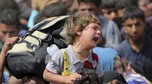 Displaced Sunni people, who fled the violence in the city of Ramadi, arrive at the outskirts of Baghdad