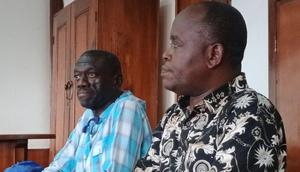 Kizza Besigye and Samuel Mukaaku