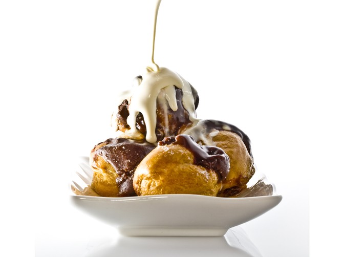 11152_stock-photo-profiteroles-with-hot-chocolate-and-cream-on-white-plate-shutterstock_45584566