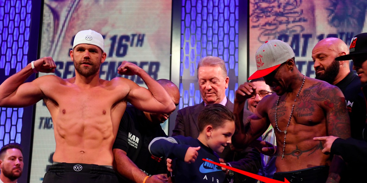 A boxing world champion's 7-year-old son punched his dad's opponent in the crotch