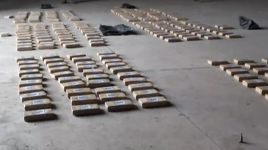 An image from a video of a Chilean police raid showing packages of what is believed to be cocaine headed to Europe.