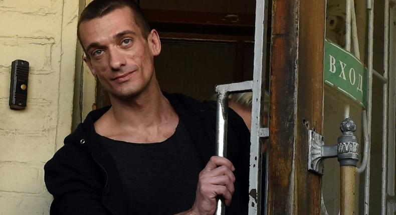 Russia's radical protest artist Pyotr Pavlensky leaves a Moscow courthouse on June 8, 2016