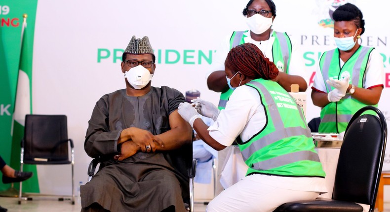 Dr. Faisal Shuaib, ED/CEO NPHCDA, receives his first shot of the COVID-19 vaccine. [Twitter/@NphcdaNG]