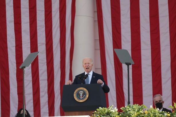 U.S. President Joe Biden speaks at the National Veterans Day Observance ceremony at the Memorial Amphitheater at Arlington National Cemetery in Arlington, Virginia, U.S., on Thursday, Nov. 11, 2021. 2021 marks the centennial anniversary of the Tomb of the Unknown Soldier, providing a final resting place for one of America's unidentified World War I service members, and Unknowns from later wars were added in 1958 and 1984. Photographer: Oliver Contreras/Bloomberg