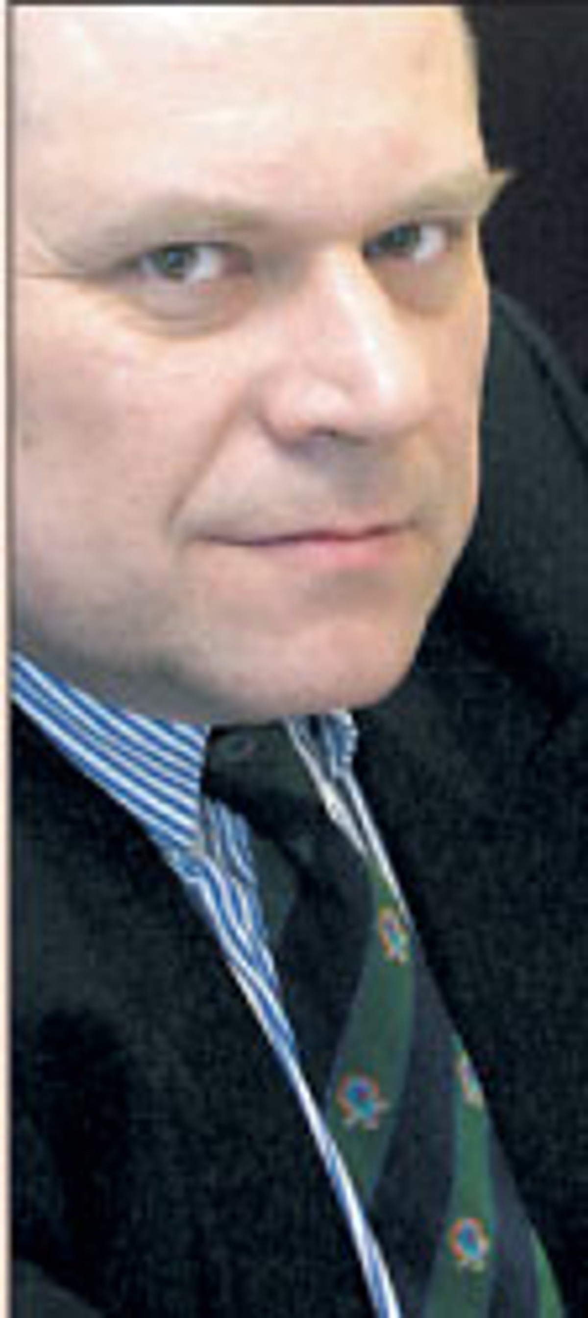 dr Janusz Fiszer, partner White & Case, docent UW