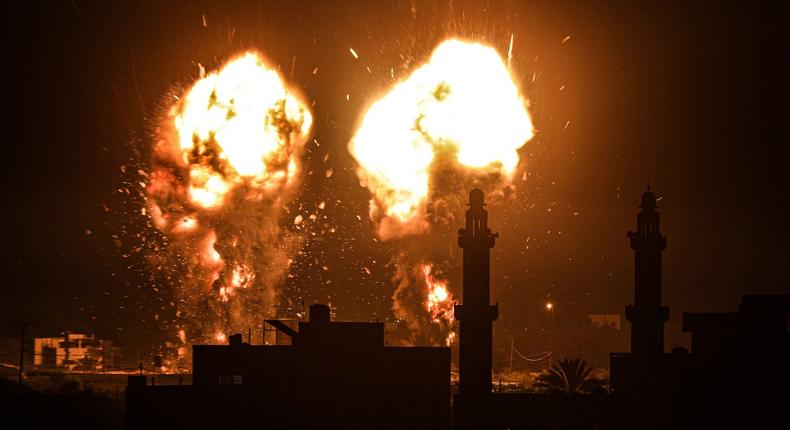 Flames are seen after an Israeli air strike hit Hamas targets in Gaza City, Gaza on June 15, 2021.
