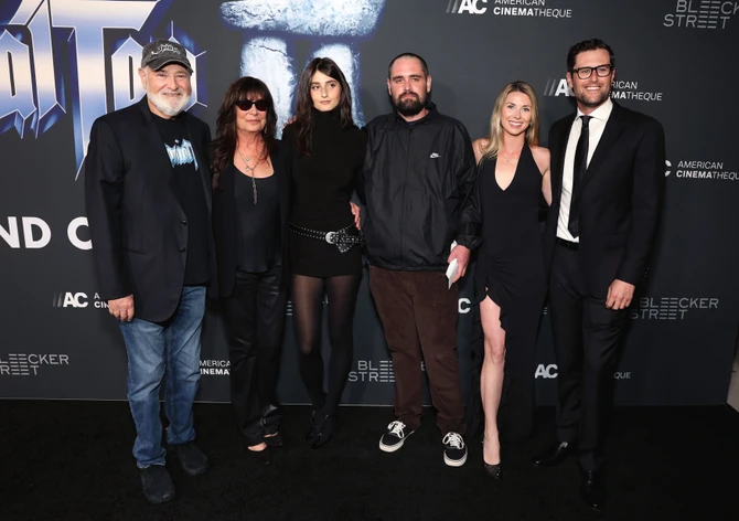 Nik Rajner (desno) sa roditeljima (levo)