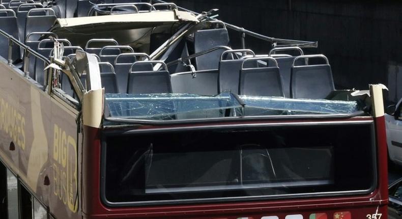 A woman was seriously injured when a bus scraped the roof of a tunnel under the Alexandre III bridge in Paris