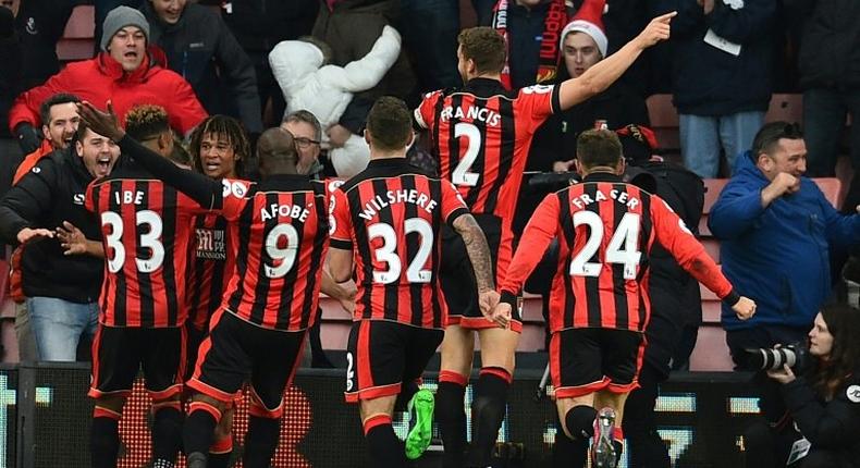 Bournemouth celebrate their fourth goal, which sealed a 4-3 win against Liverpool in Bournemouth on December 4, 2016