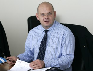 Czarnecki zepnie dwa banki: Polbank z Raiffeisenem