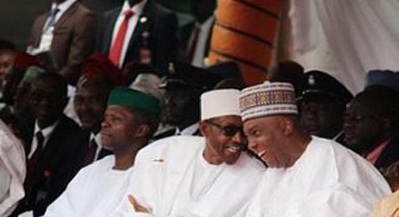 President Muhammadu Buhari shares a laugh with Senate President, Bukola Saraki on October 1, 2015 in Abuja