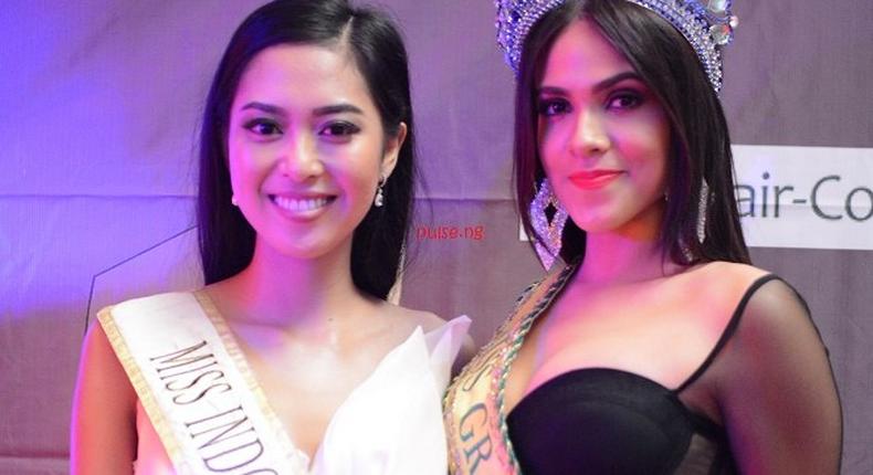 Maria Rahajeng (Miss Indonesia 2014) and Paula Gomes (Miss Grand Brazil 2015) 