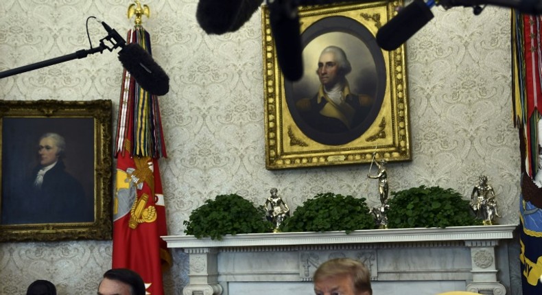 US President Donald Trump (R) meets with Brazilian President Jair Bolsonaro in the Oval Office at the White House on March 19, 2019