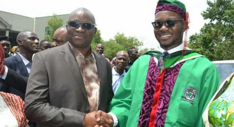 Governor Ayodele Fayose and his son.