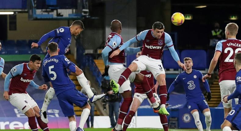 Chelsea defender Thiago Silva (third left) heads his side in front against West Ham at Stamford Bridge