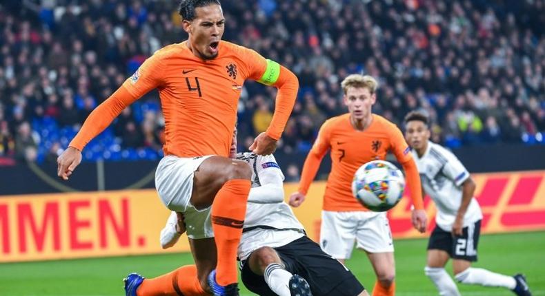 Netherlands' captain Virgil van Dijk (L) equalised in the 91st minute to grab a point in Monday's 2-2 draw against Germany, which was enough to put the Dutch into the Nations League semi-finals at the expense of world champions France.