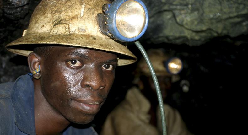 Hagai Sichone, of Konkola Copper Mines PLC, works underground in Nchanga mine in Cingola, in this April 13, 2005 file photo. 